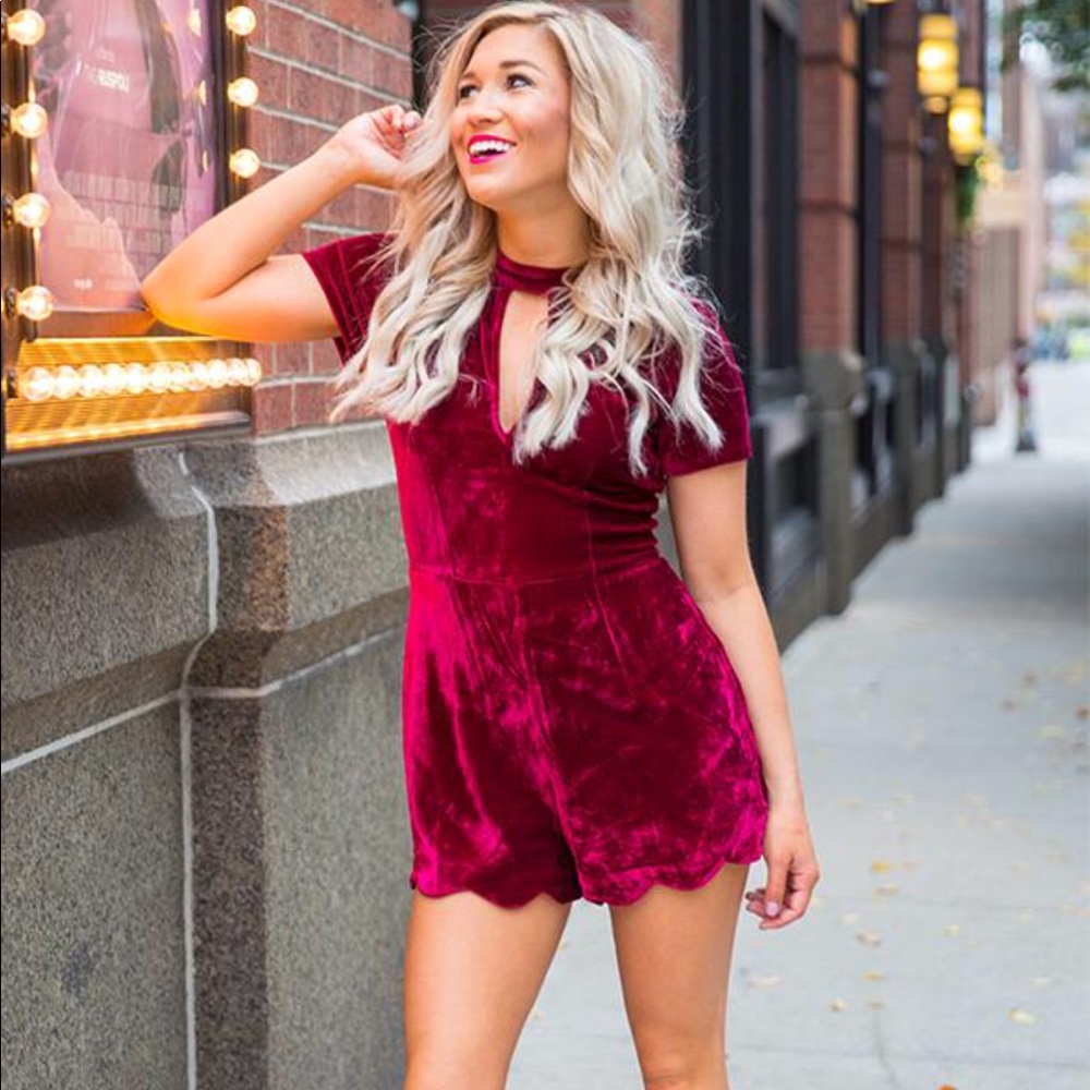 Red velvet boutique romper with lace detail